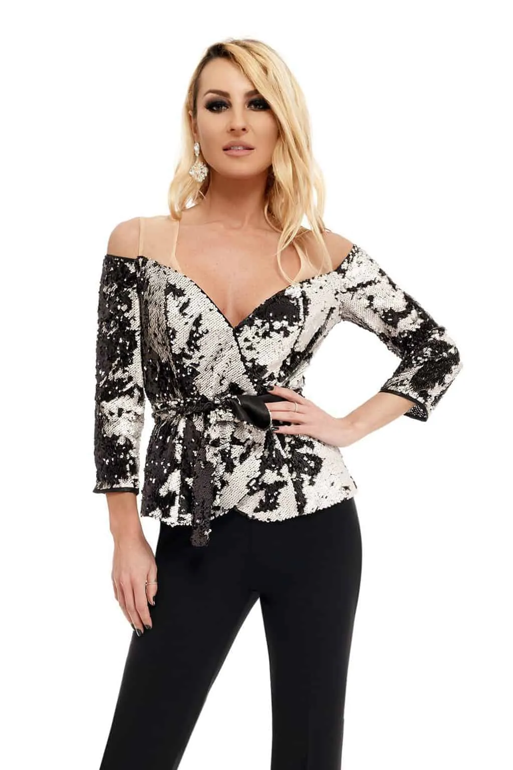 Completo elegante con giacca in paillettes cangiati bianco nero