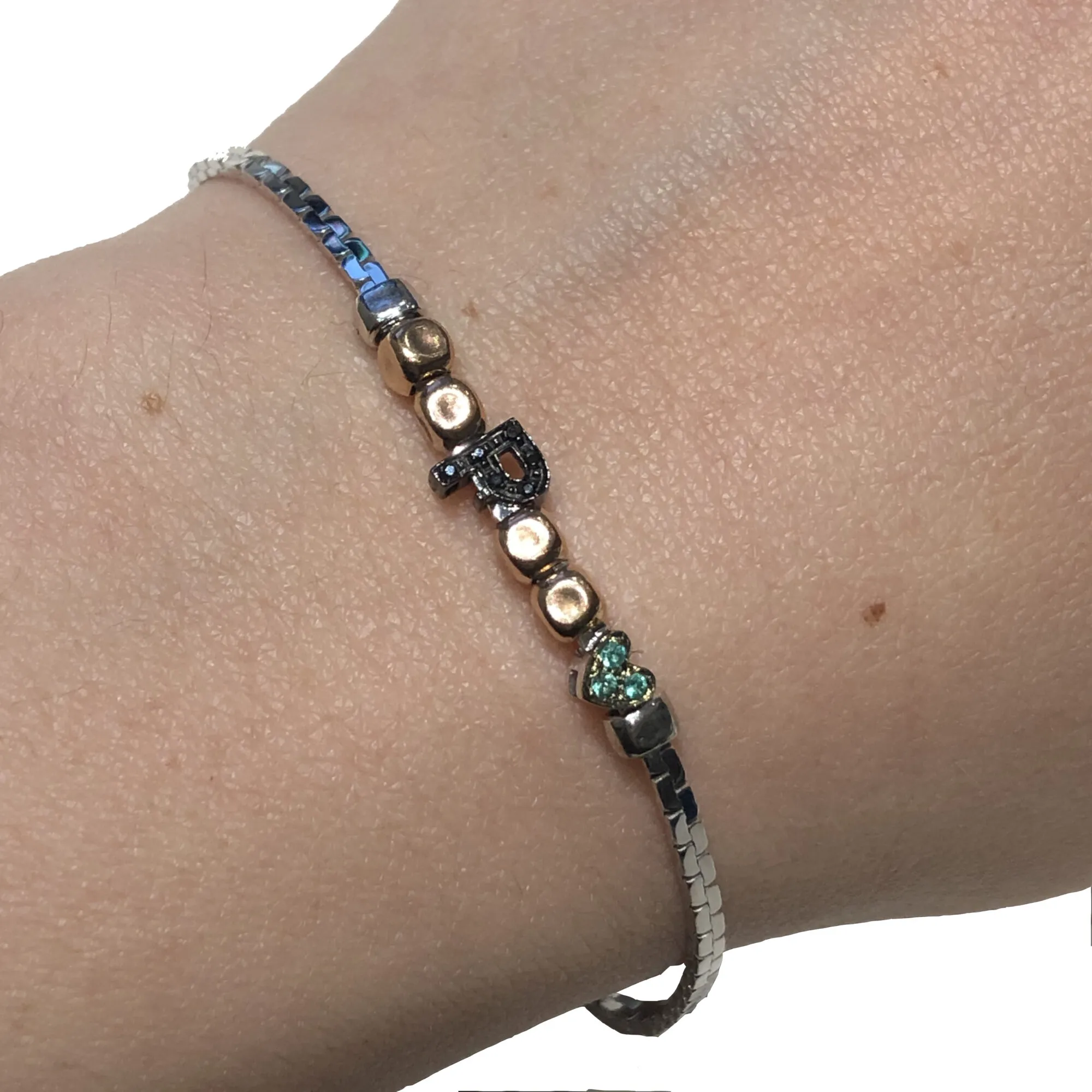 Elements – Bracciale tennis con pepite, lettera e cuore