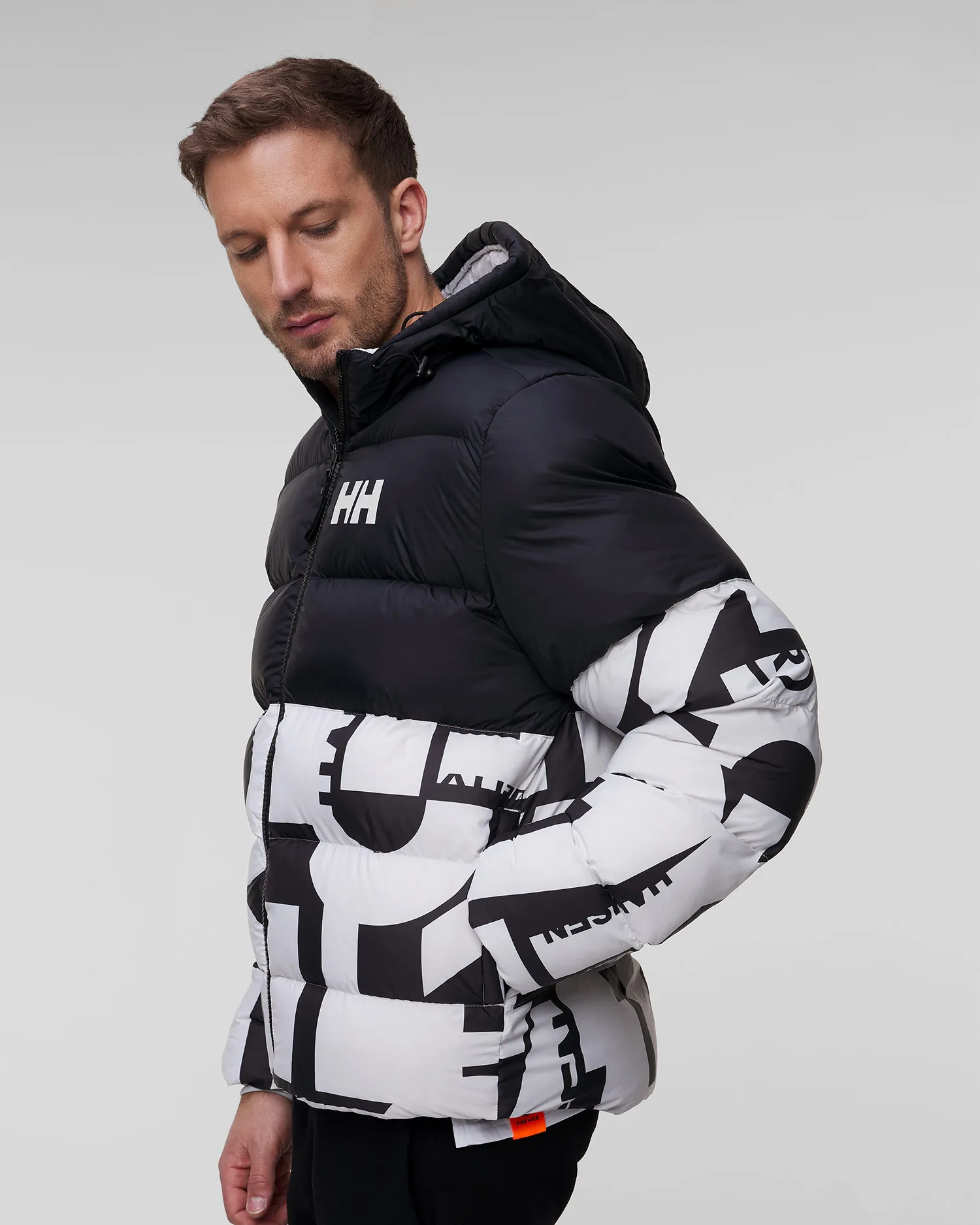 Giacca bianco-nera imbottita da uomo Helly Hansen Active Puffy 53523-823