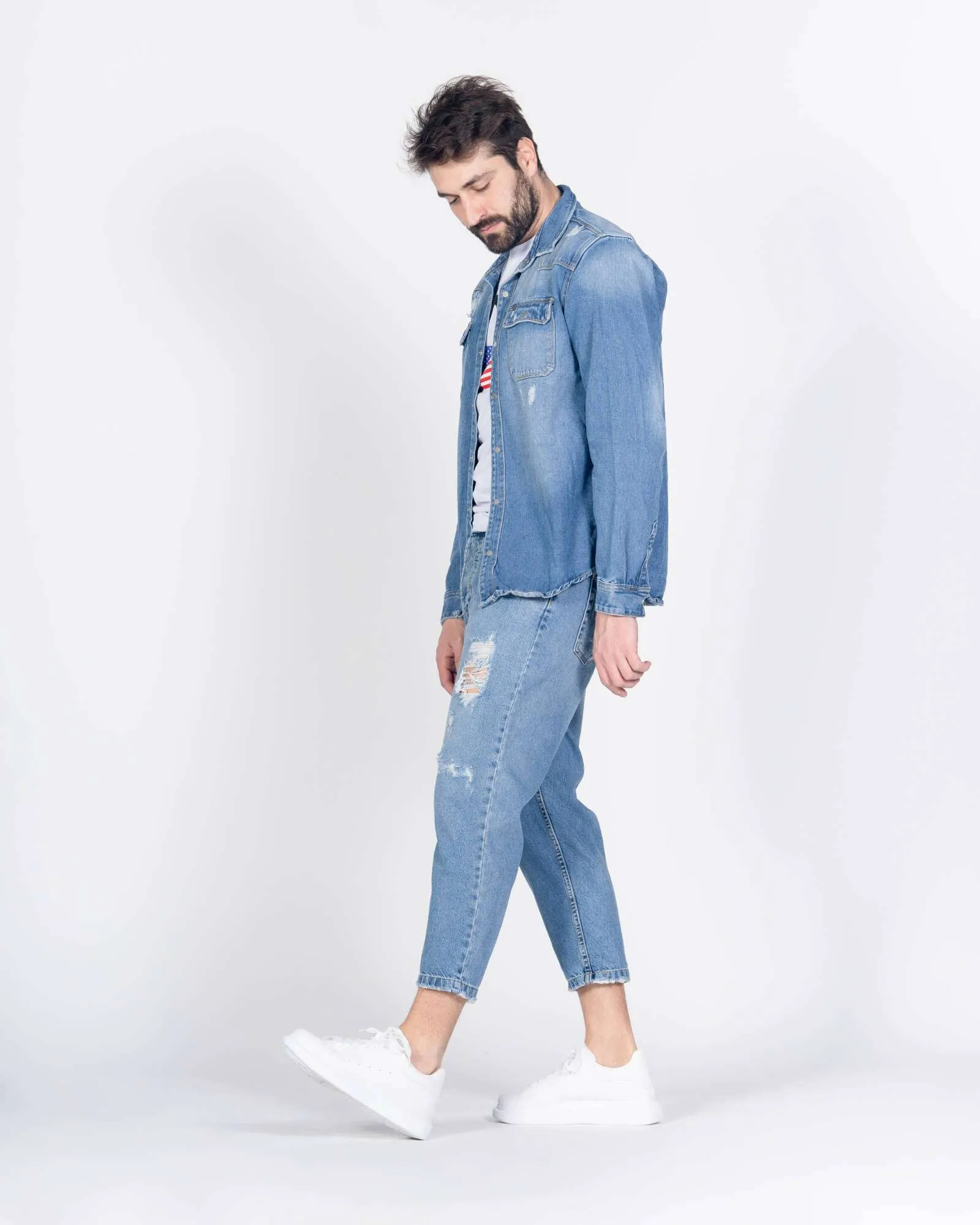 Jeans largo con strappi
