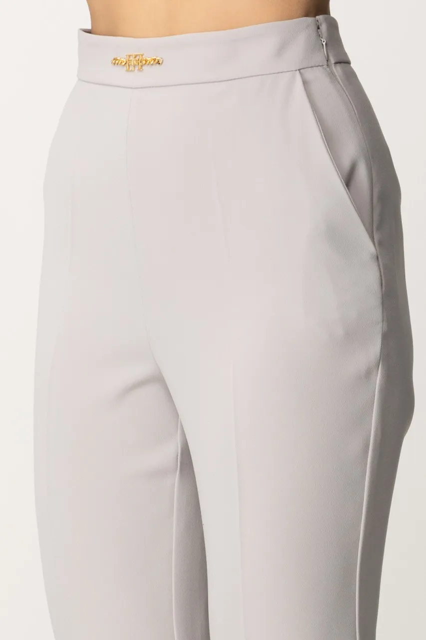 Pantaloni con logo in vita e spacchetti Perla