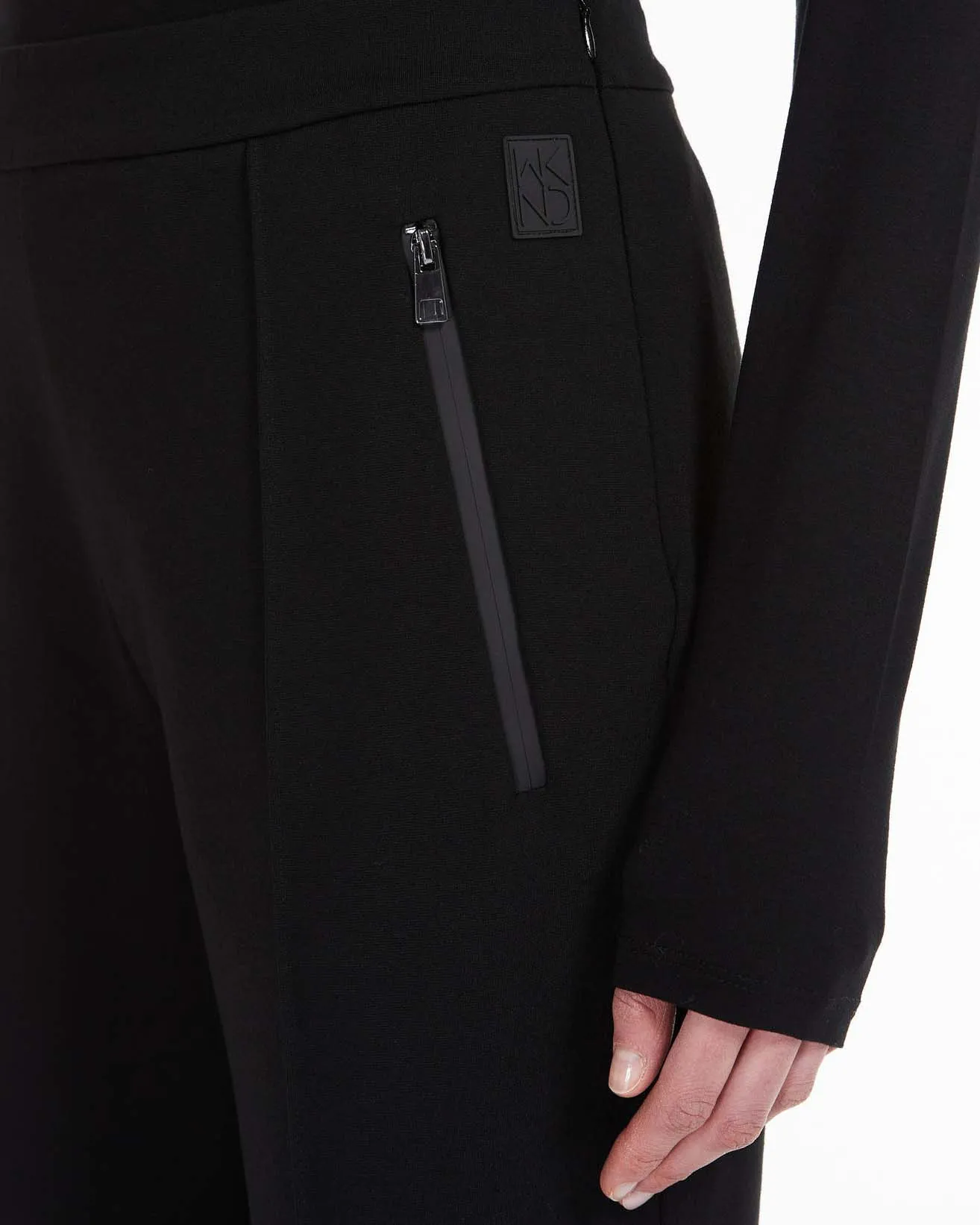 Pantaloni neri in jersey in misto viscosa punto Milano con nervatura fronte e retro