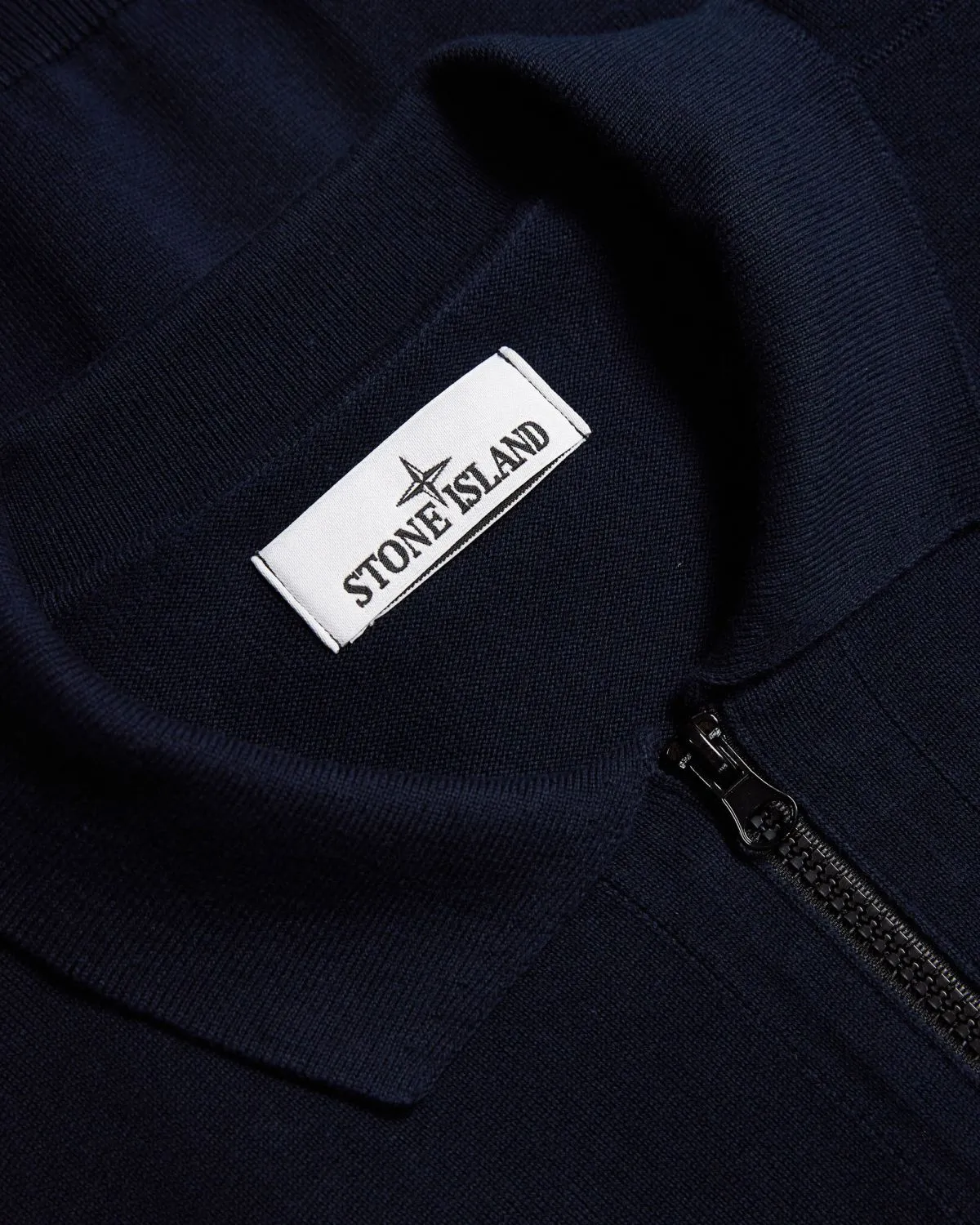 Polo in maglia blu con zip