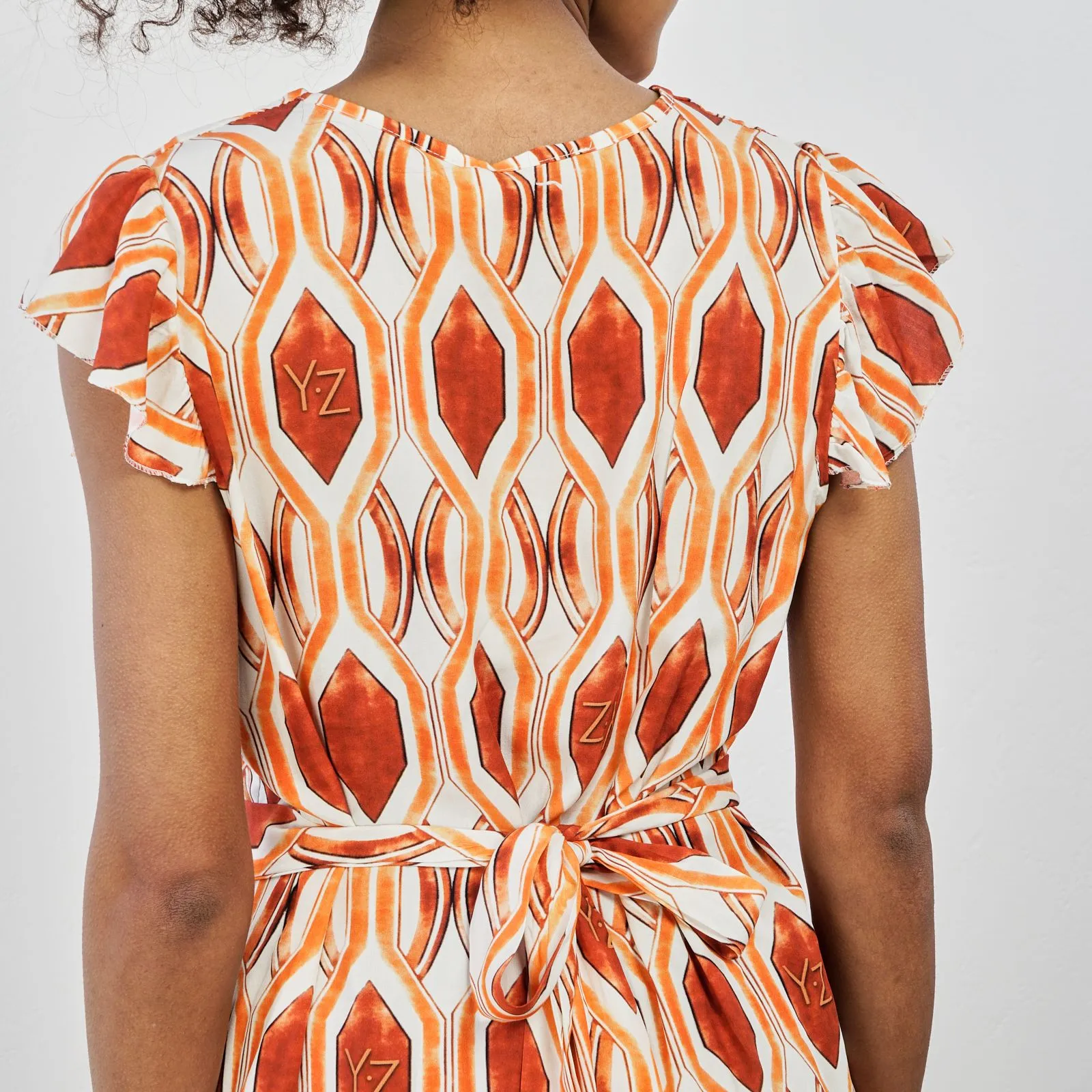 Vestito midi arancione con stampa geometrica