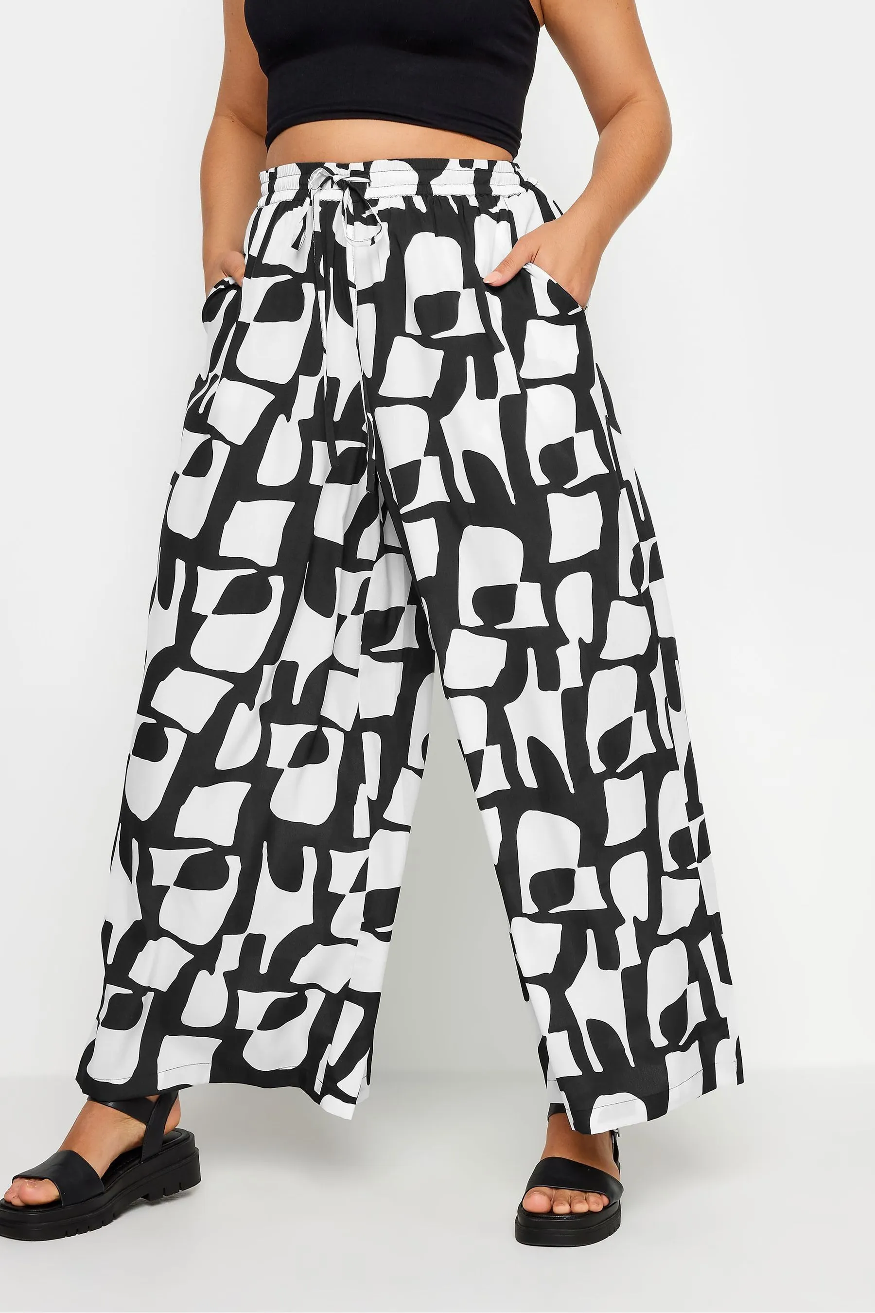 Yours Curve COLLECTION - Pantaloni a fondo ampio con coulisse e stampa astratta Stampa    